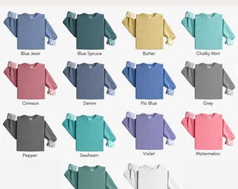 May include: A display of Comfort Colors 1566 sweatshirts in various colors, including Blue Jean, Blue Spruce, Butter, Chalky Mint, Crimson, Denim, Flo Blue, Grey, Pepper, Seafoam, Violet, Watermelon, Light Green, and White.