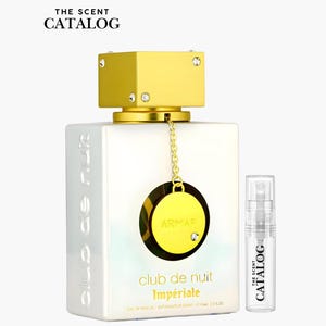 May include: A white perfume bottle with a gold cap and a small sample bottle. The large bottle has the words "Club de Nuit Impériale" and "Armaf" on it. The sample bottle has the words "The Scent Catalog" on it.