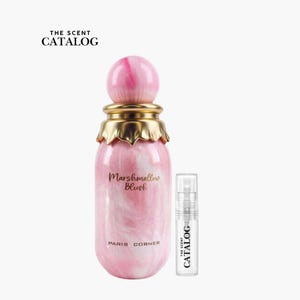 May include: A pink and white swirled perfume bottle with a gold cap and a smaller sample bottle. The perfume bottle has the words "Marshmallow Blush" and "Paris Corner" printed on it. The smaller bottle has "The Scent Catalog" printed on it.