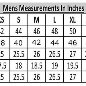 May include: A chart titled "Mens Measurements In Inches" displays size information for clothing. Measurements include chest, waist, sleeves, shoulders, and length, ranging from XXS to 5XL. The chart is in a grid format with clear labels.