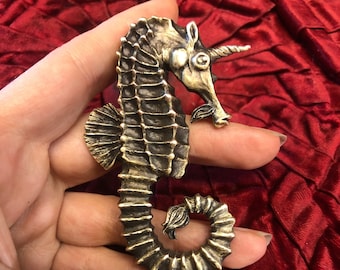 Sea Unicorn metal brooch