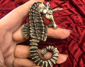 Sea Unicorn metal brooch