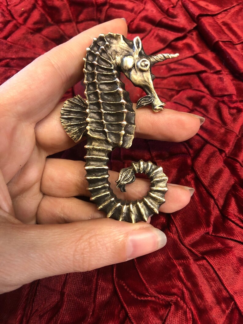 Sea Unicorn metal brooch image 1