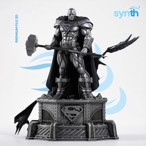 May include: A metallic gray statue of a superhero figure, holding a hammer and a staff with a wing-like design. The figure stands on a pedestal with the Superman logo. The words "PREMIUM FILE 3D" and "synth" are visible.
