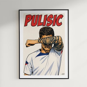 May include: A framed poster featuring a stylized illustration of a soccer player with a tiger tattoo on the forearm covering the eyes. The name PULISIC is printed in large red letters at the top. The player wears a white jersey with blue accents.