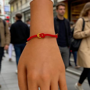 May include: A set of three ceramic nesting bowls in shades of blue, green, and white. The bowls feature a speckled glaze and a simple, modern design. The largest bowl measures approximately 8 inches in diameter.