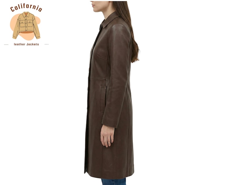 May include: A dark brown leather coat with a button-down front and a collared neckline. The coat is knee-length and has a tailored fit. The California Leather Jackets logo is in the upper left corner.