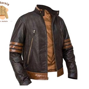 May include: A brown leather jacket with a stand-up collar and a brown interior lining. The jacket features two zippered pockets and brown stripes on the sleeves. The logo "California leather jackets" is in the upper left corner.