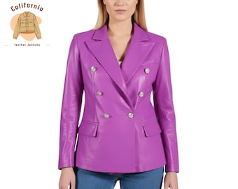May include: A vibrant purple leather blazer with a double-breasted design. The blazer features silver-colored buttons and two front pockets. The jacket is a stylish outerwear piece.