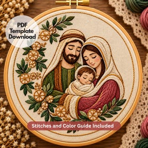 May include: An embroidery hoop containing a fabric panel with a stitched nativity scene featuring a family. The text reads PDF Template Download and Stitches and Color Guide Included. The design includes orange slices and green leaves.