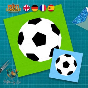 May include: A digital pattern featuring a soccer ball graphic with black pentagons and white hexagons. The design is presented on a bright green square background, with a smaller blue square version and a corner of a blue patterned envelope visible.