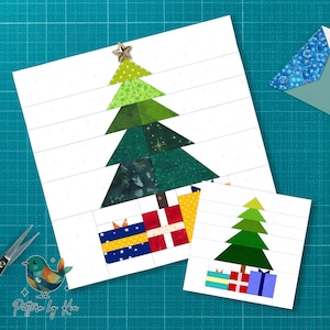 Könnte beinhalten: Ein Weihnachtsbaum-Quiltblock-Design mit einem Stern oben, hergestellt aus verschiedenen grünen Stoffen. Unter dem Baum befinden sich bunte Geschenkboxen. Eine kleinere Version des Designs ist ebenfalls vorhanden.