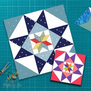 May include: Two colorful quilt blocks with star patterns. The larger block features a central star in red, yellow, and green, surrounded by white and navy blue triangles. The smaller block has a pink background with a star pattern in purple, pink, and orange.