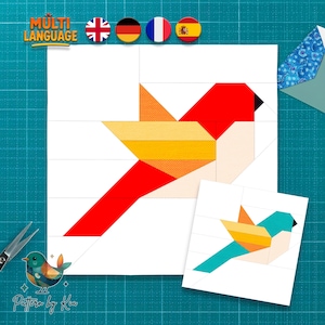 Puede incluir: Un cuadrado blanco con un diseño de pájaro rojo, naranja y amarillo, con un diseño de pájaro turquesa más pequeño. La imagen incluye el texto "MULTI LANGUAGE" y el texto "Pattern by Kia".