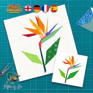 May include: A paper piecing pattern of a bird of paradise flower in shades of orange, yellow, green, red, and blue. The image includes the text "MULTI LANGUAGE" and "Pattern by Kia". Scissors and a small bird illustration are also visible.