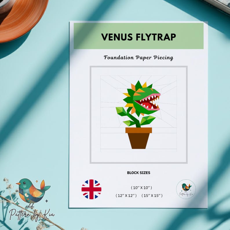 May include: A Venus Flytrap foundation paper piecing pattern document. The page features a graphic of a green and orange plant in a brown pot, with text reading VENUS FLYTRAP, Foundation Paper Piecing, and block sizes of 10x10, 12x12, and 15x15 inches.