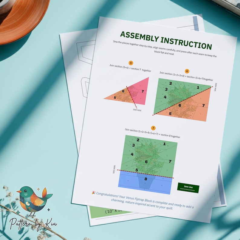 May include: A white paper document titled ASSEMBLY INSTRUCTION featuring diagrams for sewing a Venus Flytrap quilt block. The page includes numbered sections, colored shapes, and text instructions for joining pieces, with a small bird logo at the bottom.