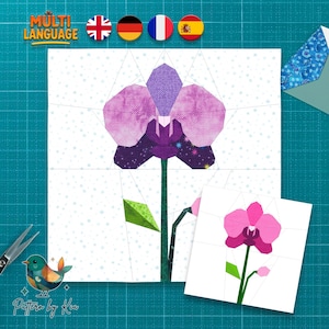 Puede incluir: Un patrón de flor de orquídea de tela en tonos morado, rosa y verde, con una versión más pequeña al lado. El diseño está sobre un fondo blanco con un patrón de cuadrícula. La imagen incluye el texto "Multi Language" y "Pattern by Kia".