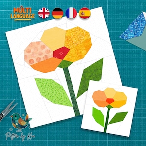 May include: A colorful floral quilt block design featuring a large flower with yellow, orange, and red petals, green leaves, and a green stem. A smaller version of the flower is also present. The image includes the text "MULTI LANGUAGE" and "Pattern by Kia".