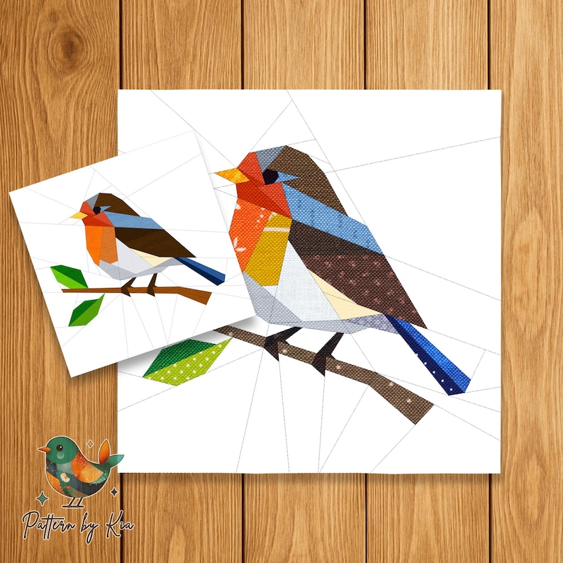 May include: Two bird-themed art prints. The larger print features a colorful geometric bird perched on a branch. The smaller print shows a similar bird design. The birds have orange, blue, brown, and yellow accents. The prints are on a white background.