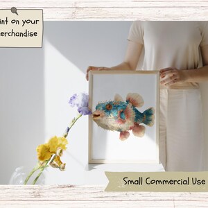 May include: A framed digital art print featuring a detailed illustration of a blue and orange pufferfish with visible spines. The artwork is displayed in a light-colored wooden frame. The text Print on your merchandise and Small Commercial Use Incl. appears.