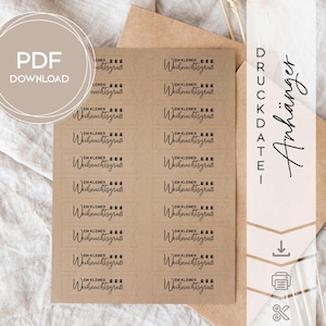 May include: A sheet of kraft paper stickers with the text "Ein kleiner Weihnachtsgruß" in black script. The stickers are rectangular with a dotted border. The words "PDF DOWNLOAD" are in a circle in the upper left corner.