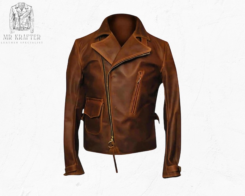 May include: A brown leather jacket with an asymmetrical zipper closure, a notched collar, and multiple pockets. The jacket has a vintage, distressed look and features the text "MR KRAFTER LEATHER SPECIALIST".