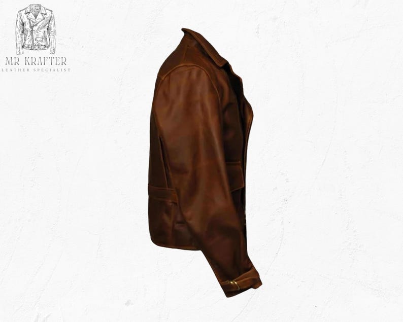 May include: A brown leather jacket with a classic design. The jacket features a notched collar, two front pockets, and a buttoned cuff. The jacket is made of a distressed leather material.