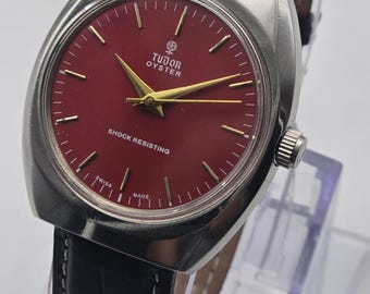 Vintage Tudor Oyester Watch: Restored Swiss Manual Winding-red Dial