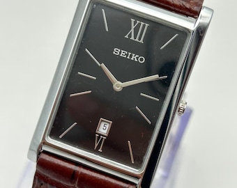 Vintage Seiko Slim Tank Watch: Black Dial Case, Leather Band, Unisex Timepiece