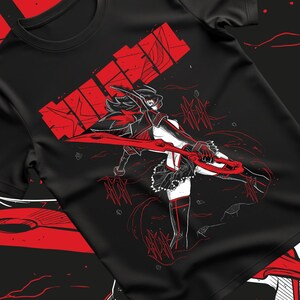 May include: Black t-shirt featuring a red and white graphic of a female anime character wielding a large red weapon. The design includes red text and accents, creating a dynamic and action-oriented aesthetic. The shirt is made of a soft material.