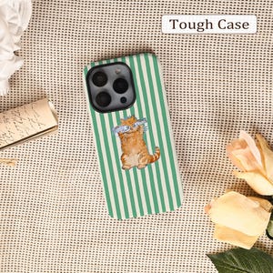 May include: A phone case with a green and white striped design. It features an illustration of a ginger cat holding two fish. The text "Tough Case" is displayed in a white rectangle at the top.