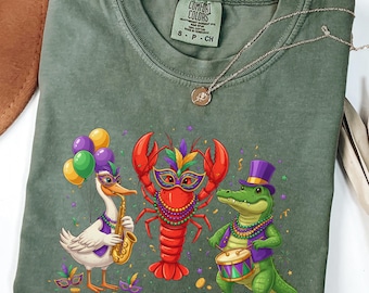 Camiseta retro de Mardi Gras con colores cómodos: divertida camiseta a juego de Mardi Gras con cocodrilo, cangrejo, ganso y flor de lis.