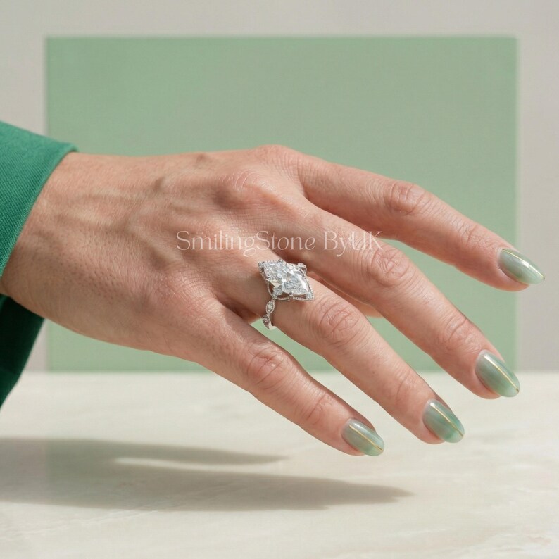 Stunning personalized 14k gold bridal jewelry ideal for a modern wedding band stack. This custom bespoke engagement ring captures the essence of a romantic proposal. The art deco aesthetic and floral halo design complete the perfect wedding set. Essential ethical bridal gem, vintage bridal set, custom anniversary token, bespoke bridal gem, brilliant cut bridal, and regal bridal piece.