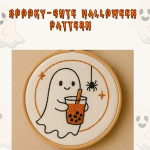 May include: A white fabric embroidery hoop featuring a cute ghost holding a boba tea. The ghost is smiling, and a black spider hangs from a string. The text "Spooky-Cute Halloween Pattern" is above the embroidery.