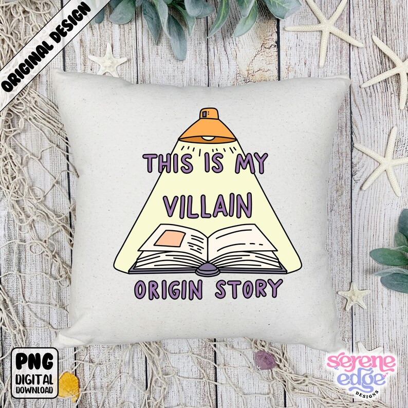 May include: Square off-white throw pillow with the text "THIS IS MY VILLAIN ORIGIN STORY" in purple, with a cartoon illustration of a book under a spotlight. The pillow has a digital download label.