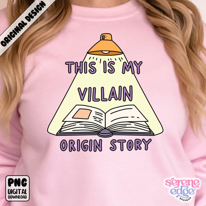 May include: Pink sweatshirt with the text "THIS IS MY VILLAIN ORIGIN STORY" in purple and white. The design features an open book under a spotlight, with the words arranged around it. The sweatshirt also has the text "ORIGINAL DESIGN" and "PNG DIGITAL DOWNLOAD".