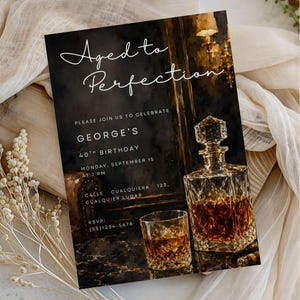 May include: An invitation with the text "Aged to Perfection" for George's 40th birthday. The design features a crystal decanter and a glass of amber liquid, likely whiskey, on a dark background. The invitation includes the date, time, and RSVP information.