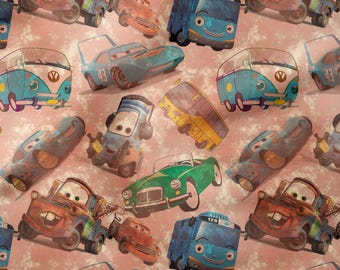 May include: A repeating pattern of cartoon cars in various colors, including blue, green, and orange, on a pink background. The cars have friendly faces and are in different styles, such as buses, race cars, and trucks.