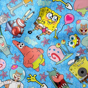 May include: A vibrant, repeating pattern featuring characters from the animated series, SpongeBob SquarePants. The design includes SpongeBob, Patrick Star, Squidward, Mr. Krabs, Sandy Cheeks, and Plankton, along with starfish and other aquatic elements, all set against a light blue background.