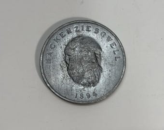 Medaglia/gettone commemorativo di Sir Mackenzie Bowell, Primo Ministro canadese dal 1894 al 1896.