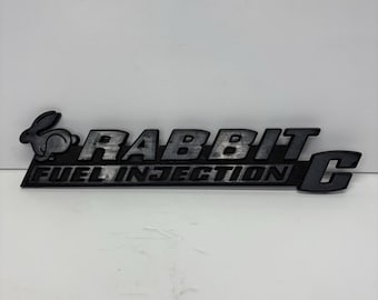 75 76 77 78 79 80 81 82 83 84 VW Rabbit C Rear Emblem Logo Badge Used OEM A24234