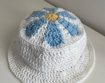 Hand Crocheted Flower Bucket Hat - Medium/Large - White, Blue & Yellow Daisy - Made sustainably with secondhand yarn