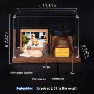 May include: A pet memorial display case with a wooden base, clear acrylic cover, and dimensions of 11.81 inches long, 7.87 inches high, and 7.87 inches wide. Includes a figurine, photo frame, fur jar, and urn.