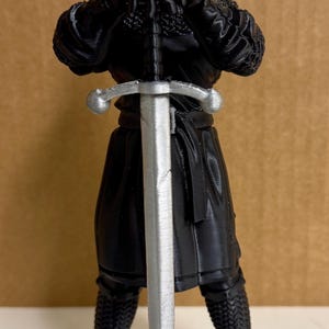 Monty Black knight figure.