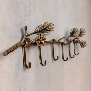 Rustic Wall Coat Rack, Hand Forged Pine Branch Hooks with Pine Cones, Cabin & Mountain Lodge Entryway Decor