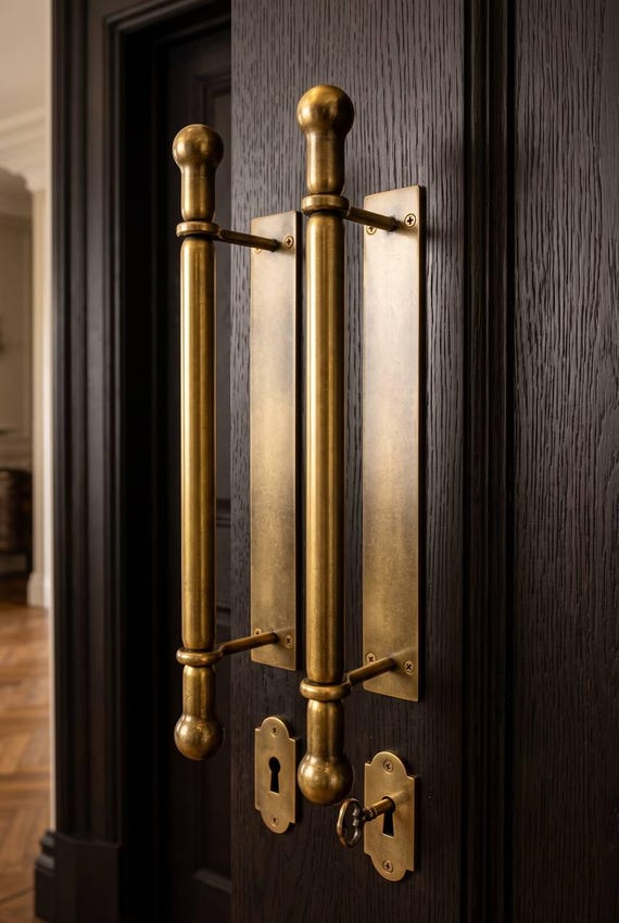 Sturdy forged handles with backplates for entrance doors; classic-style door handle,Handcrafted premium door hardware for entrance doors