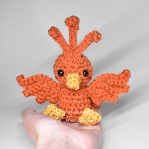 Baby phoenix pocket-sized crochet plush - Small handmade mythical creature amigurumi