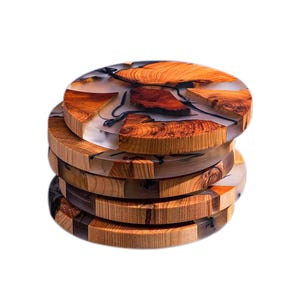 May include: A stack of five round wooden coasters. Each coaster is made of light and dark brown wood with a clear resin top. The resin contains pieces of wood and dark, organic shapes. The coasters are stacked on top of each other.
