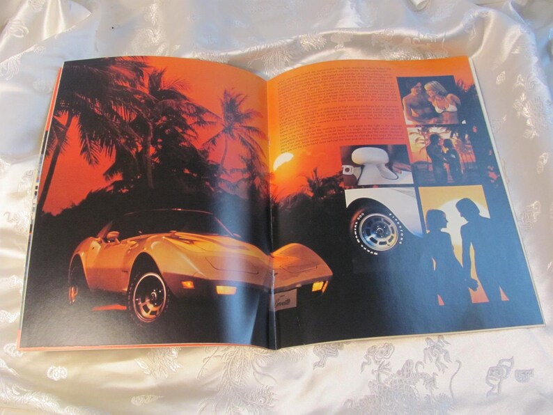 May include: Open magazine spread featuring a vintage sports car, palm trees, and a sunset. The car is a light color with black wheels. The background has a warm orange and red color palette. Additional images are on the right page.